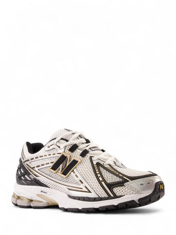 Sneakers New Balance 1906 Unisex - Bianco/Oro/Nero