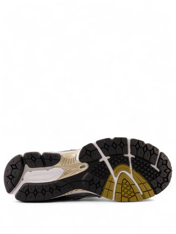Sneakers New Balance 1906 Unisex - Bianco/Oro/Nero