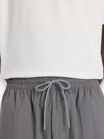 New Balance Sport Legacy Pant Castlerock - Pantaloni Uomo - Grigio
