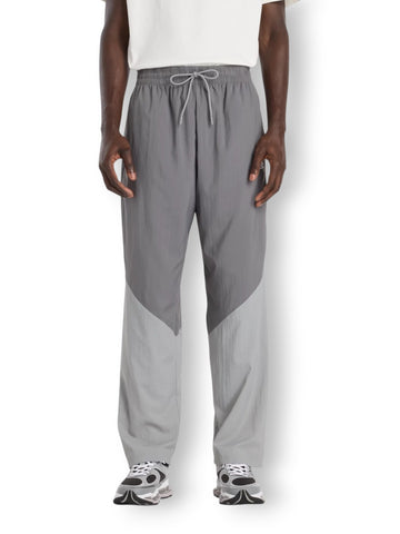 New Balance Sport Legacy Pant Castlerock - Pantaloni Uomo - Grigio
